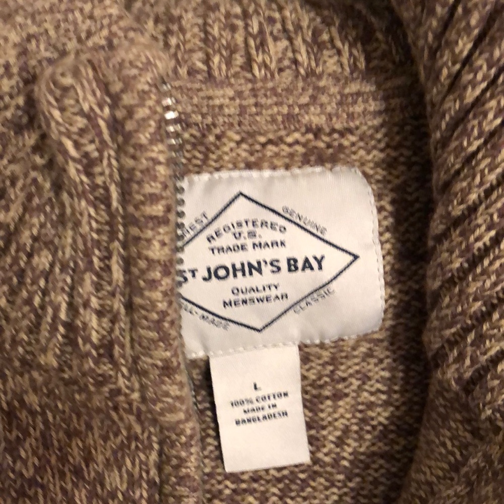 Men’s brown zippered turtle neck cotton sweater with long sleeves.